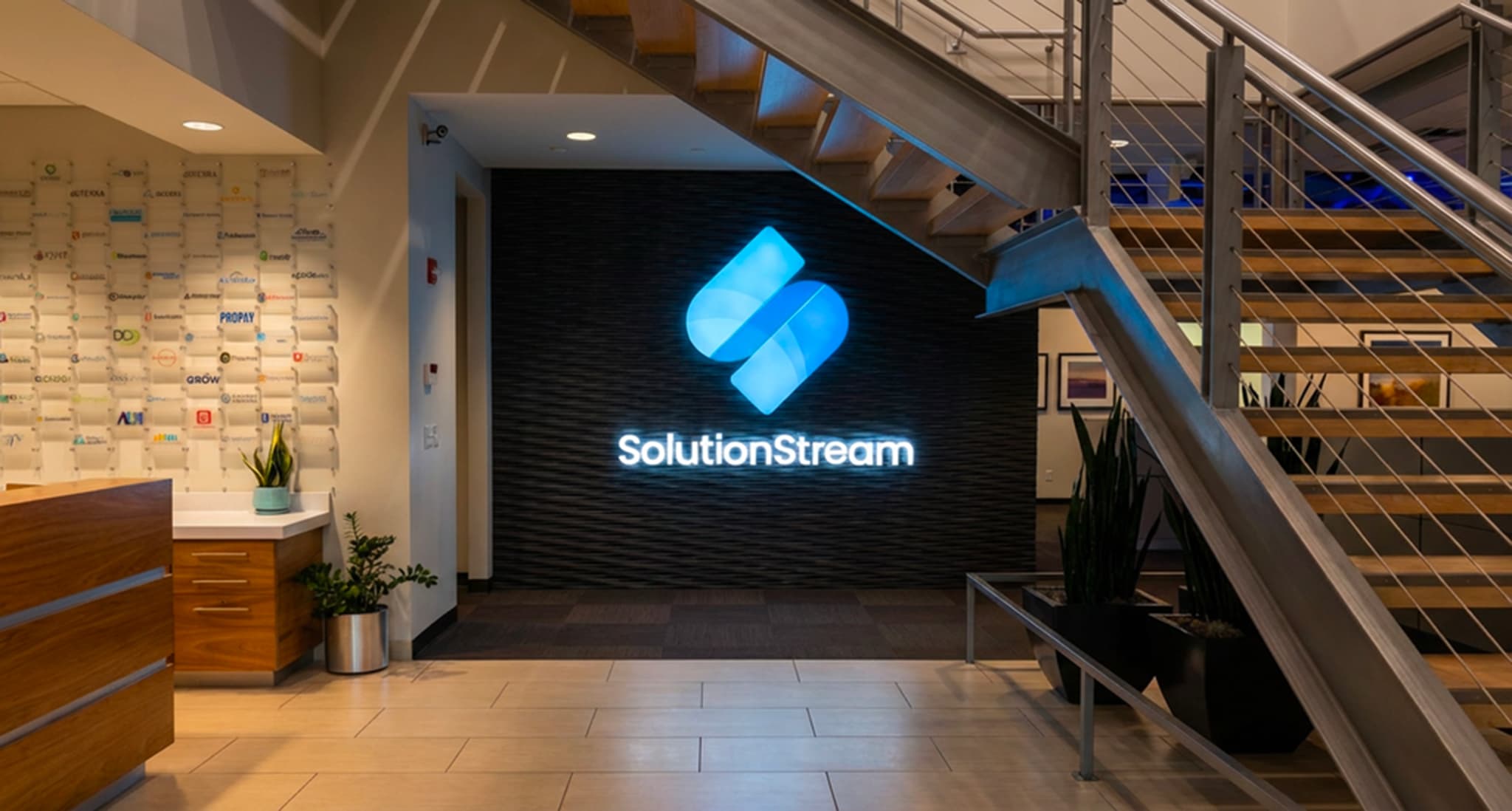 SolutionStream office — partner and client logos